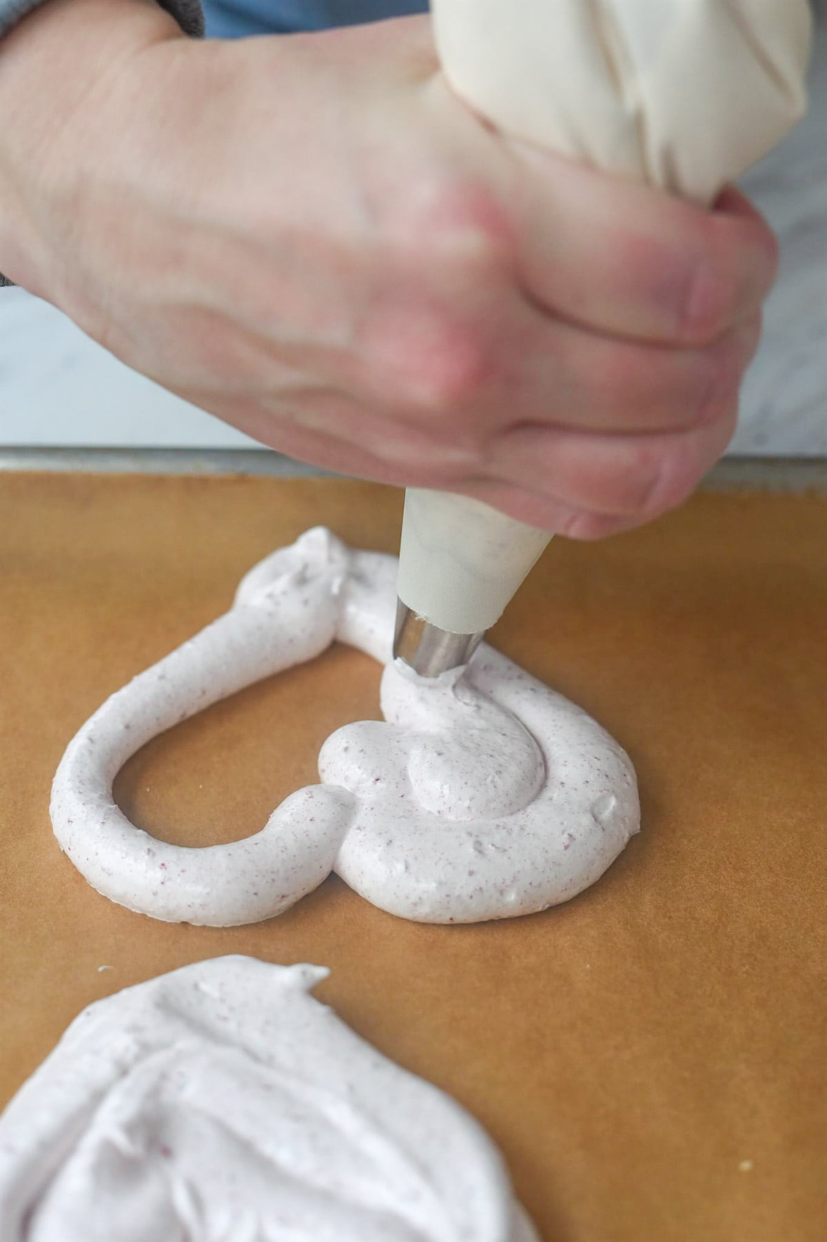 making pavlova hearts.