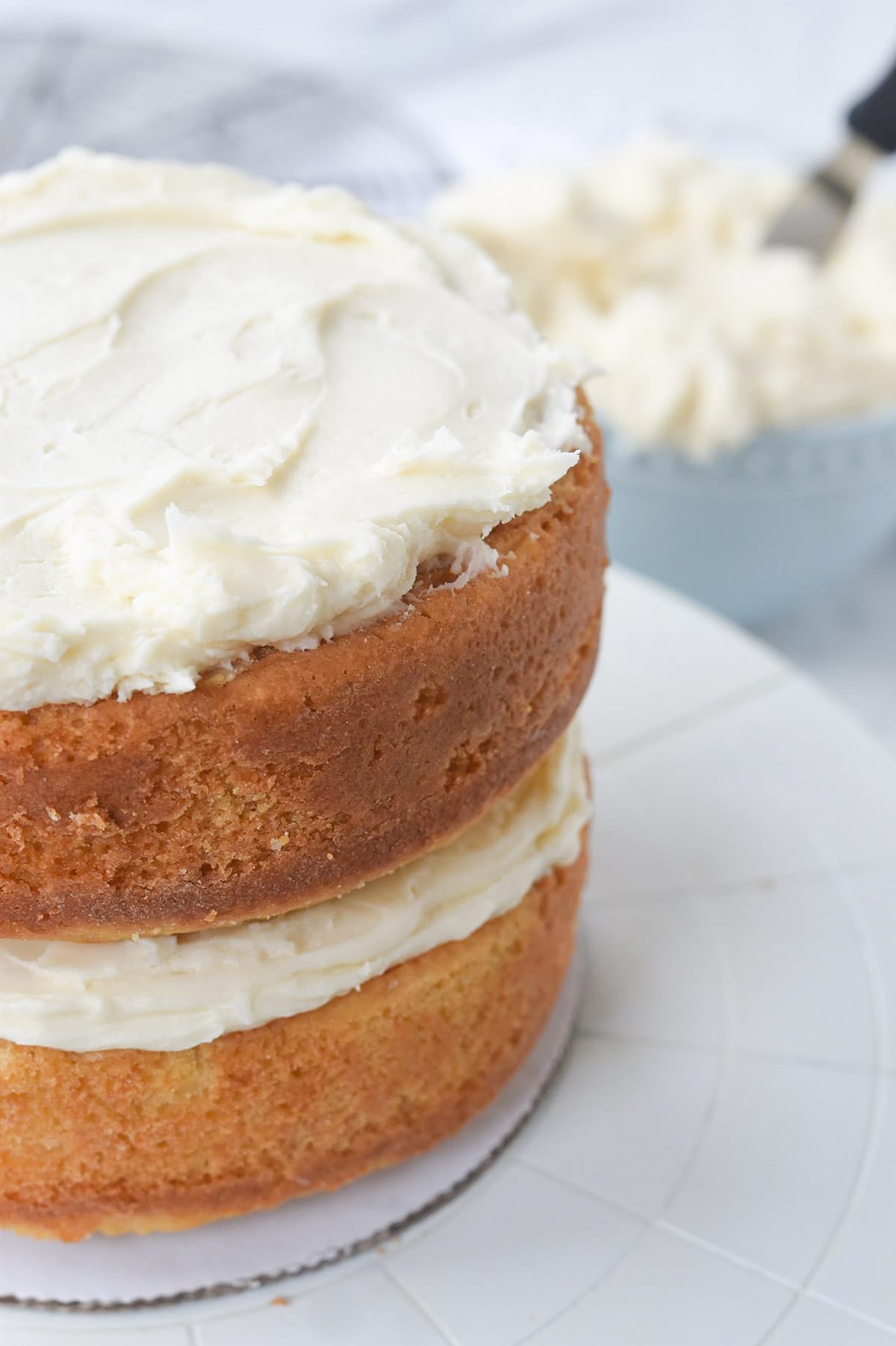 frosting a yellow cake