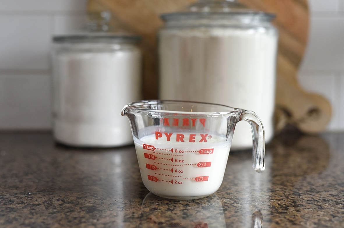 buttermilk in a measuring cup