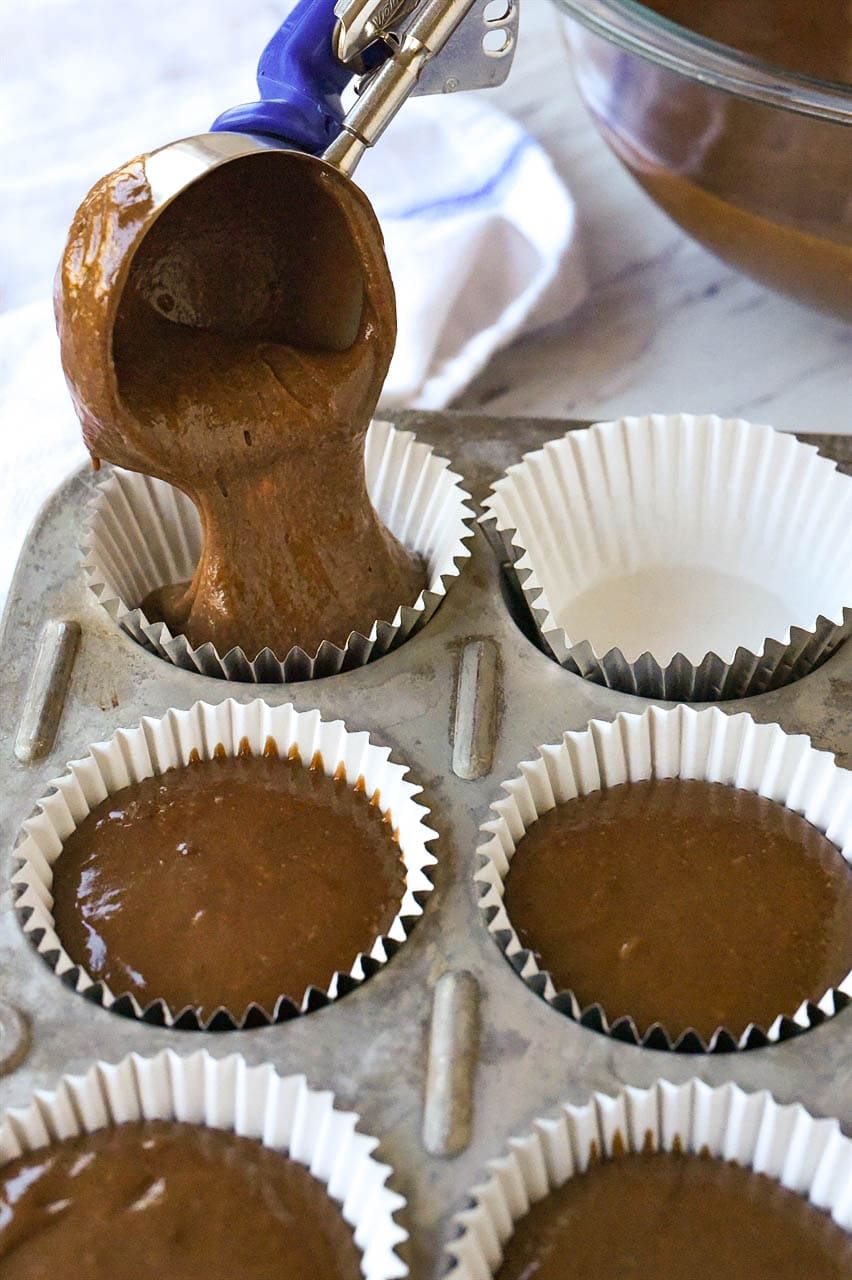 scooping cupcake batter