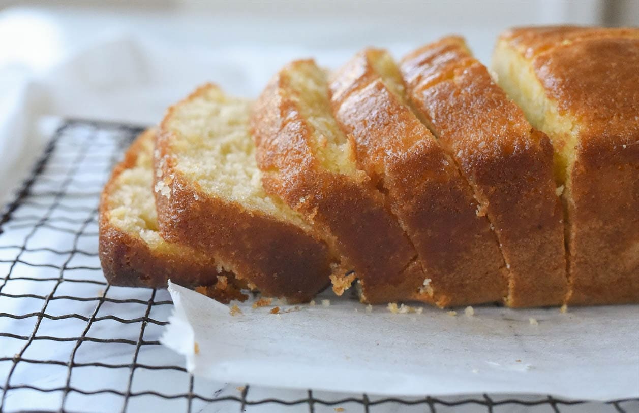 side view of loaf of sliced lemon bread