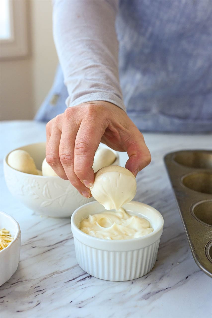 Dipping dough into mayonnaise