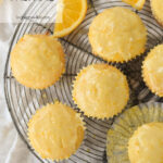 overhead shot of orange muffins on a cooling rack