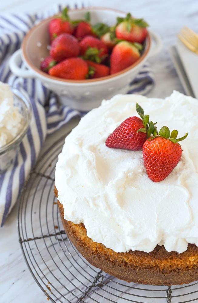 Buttermilk cake with whipped cream and strawberries