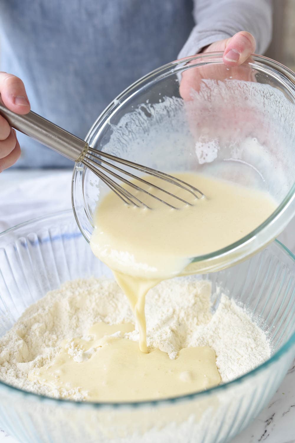 mixing pancake batter in a bowl