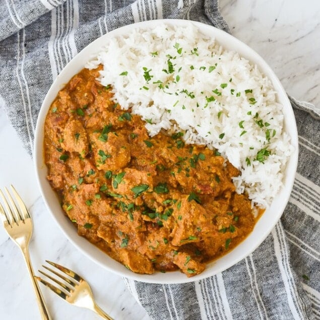 overhead shot of butter chicken in a bowl