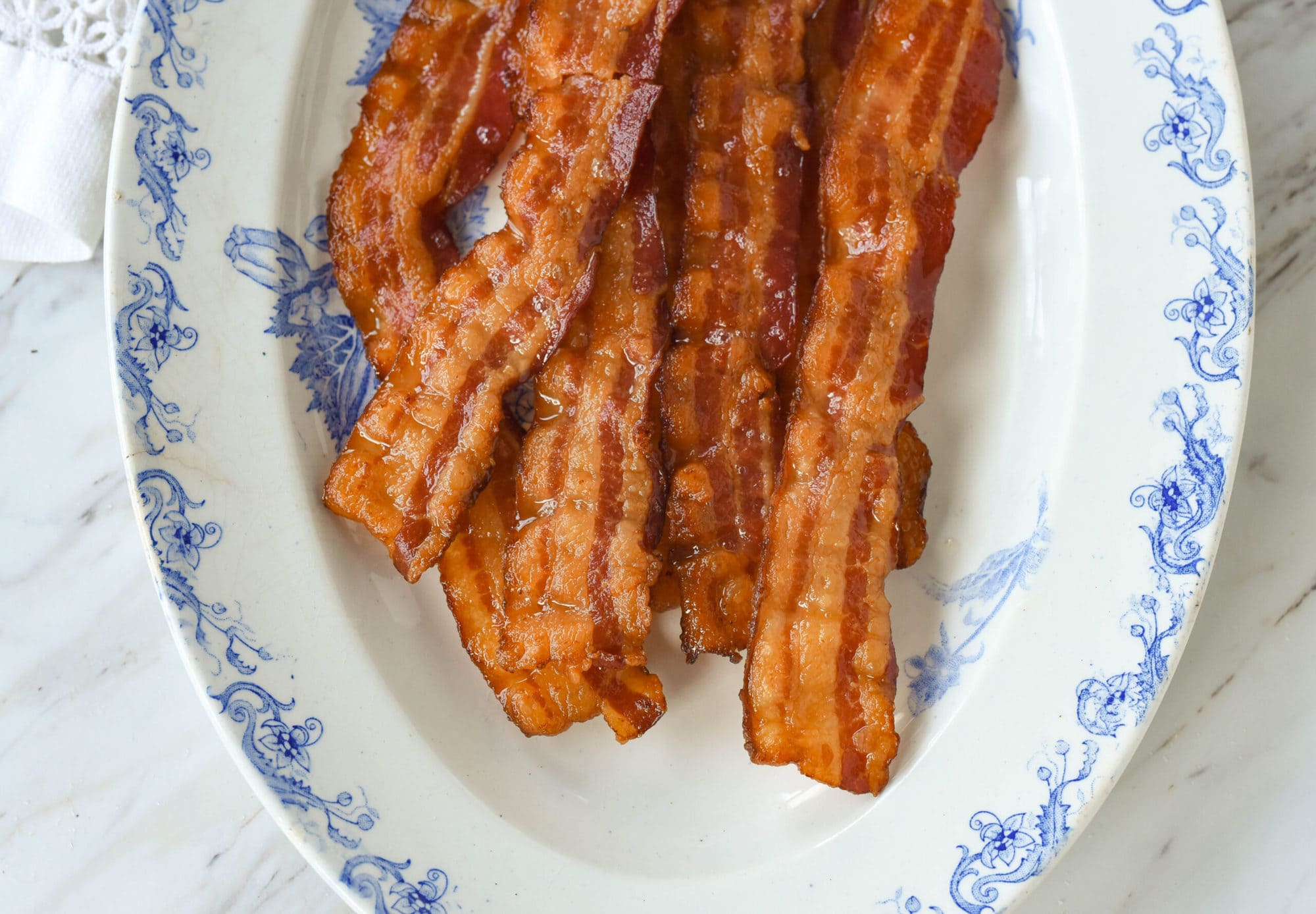 overhead shot of bacon on a plate