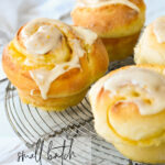 orange rolls on a cooling rack