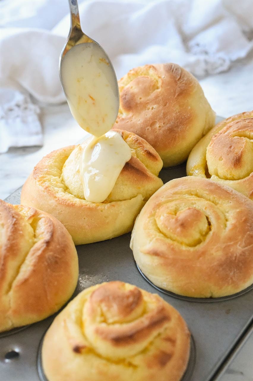 Glazing orange rolls