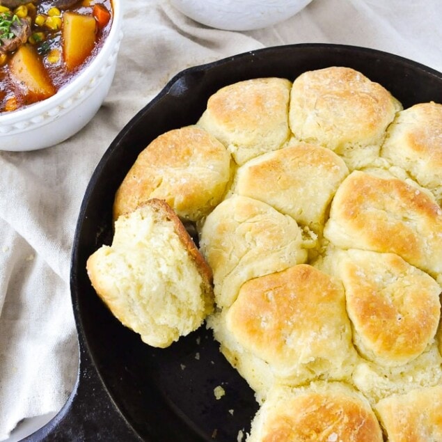 overhead shot of angel biscuits in cast iron pan