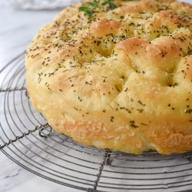 side view of a loaf of focaccia bread