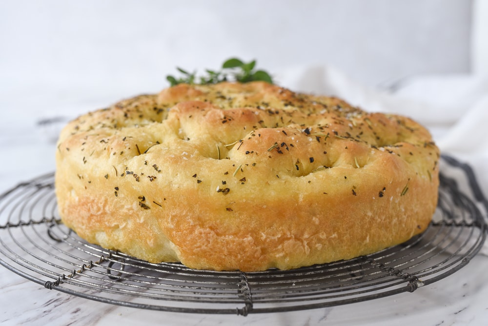 side view of a loaf of focaccia bread