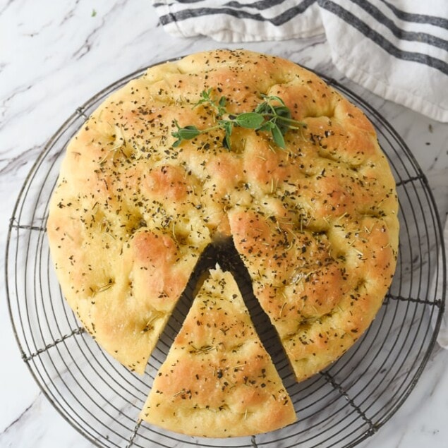 overhead shot of a round loaf of focaccia bread