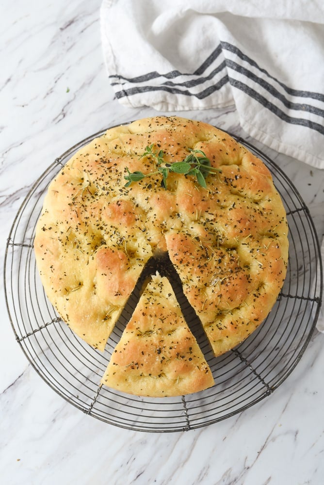 overhead shot of a round loaf of focaccia bread