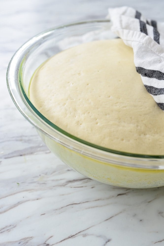 rising dough in a bowl.