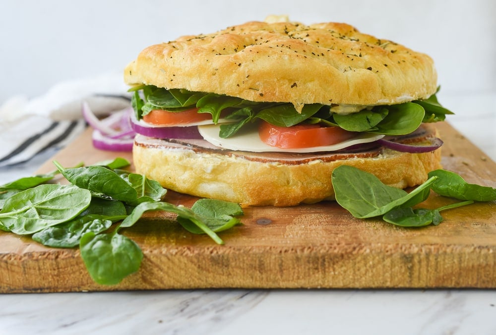 focaccia sandwich with meat and cheese.