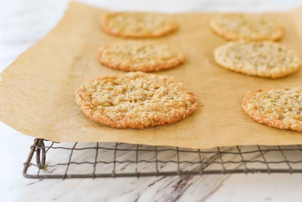 crispy oatmeal cookie on parchment paper