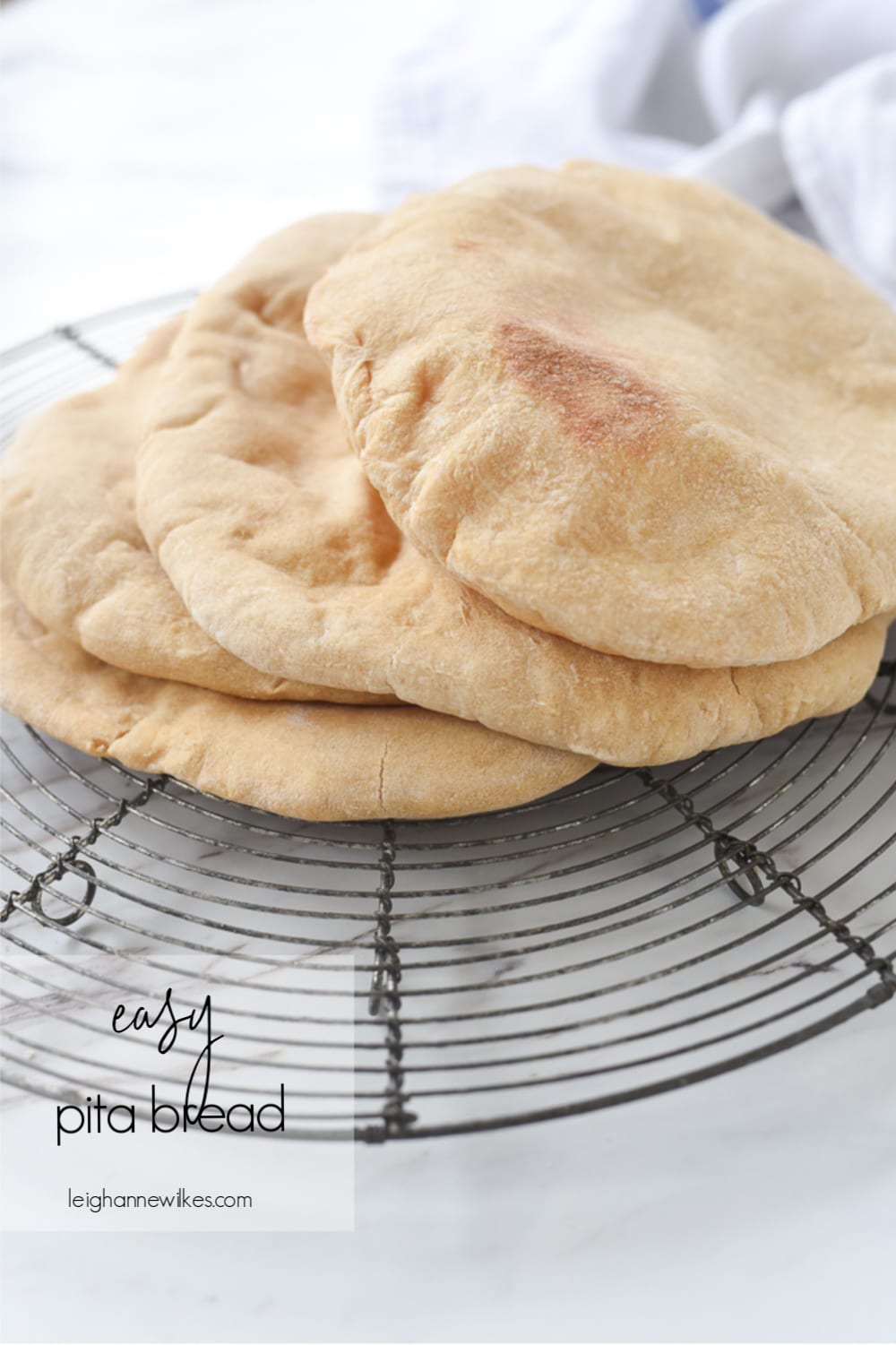 pita bread on a cooling rack