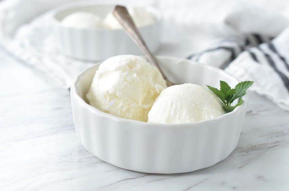 scoops of vanilla ice cream in a bowl