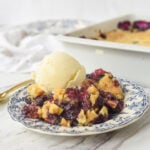 blueberry dump cake on a plate.