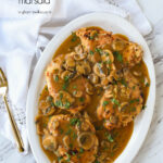 overhead shot of chicken marsala on a plate