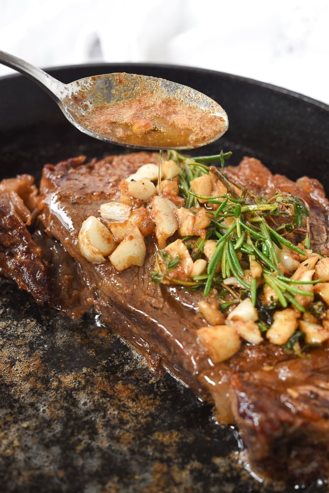 basting steak with melted butter