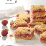 strawberry bar squares on parchment paper