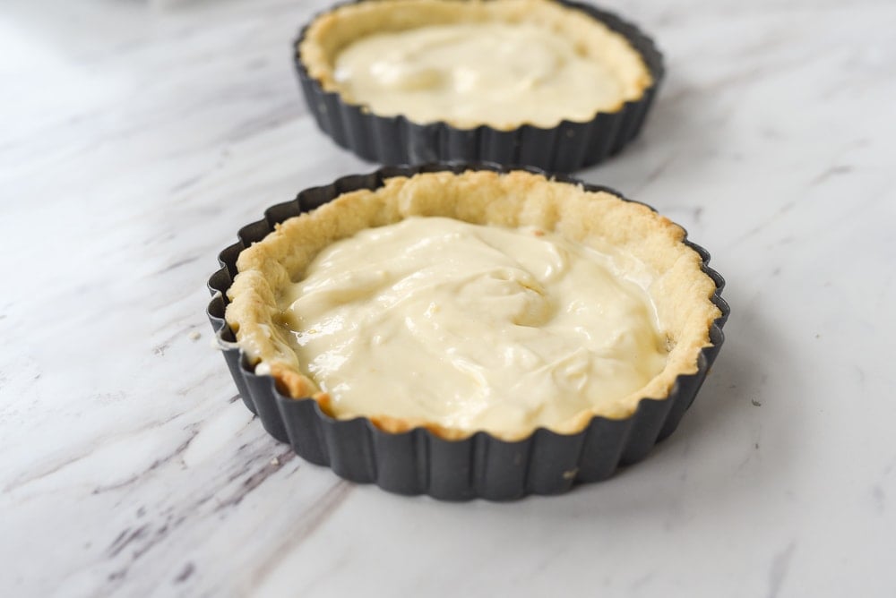 tart crust filled with cream mixture