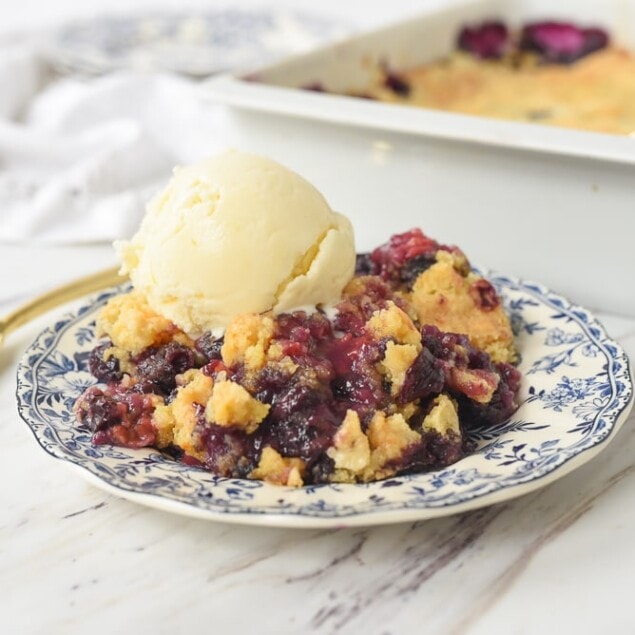 plate of blueberry dump cake