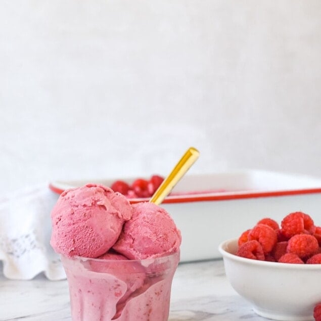 raspberry ice cream with a spoon in it