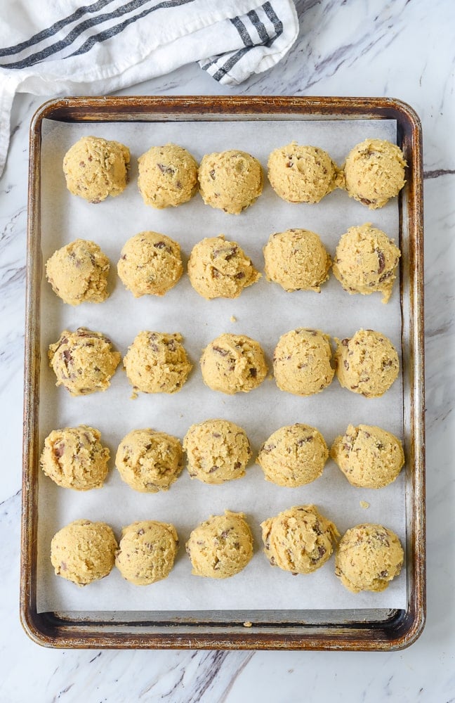 balls of cookie dough on baking sheet