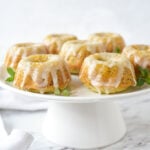 mini orange bundt cakes on a plate