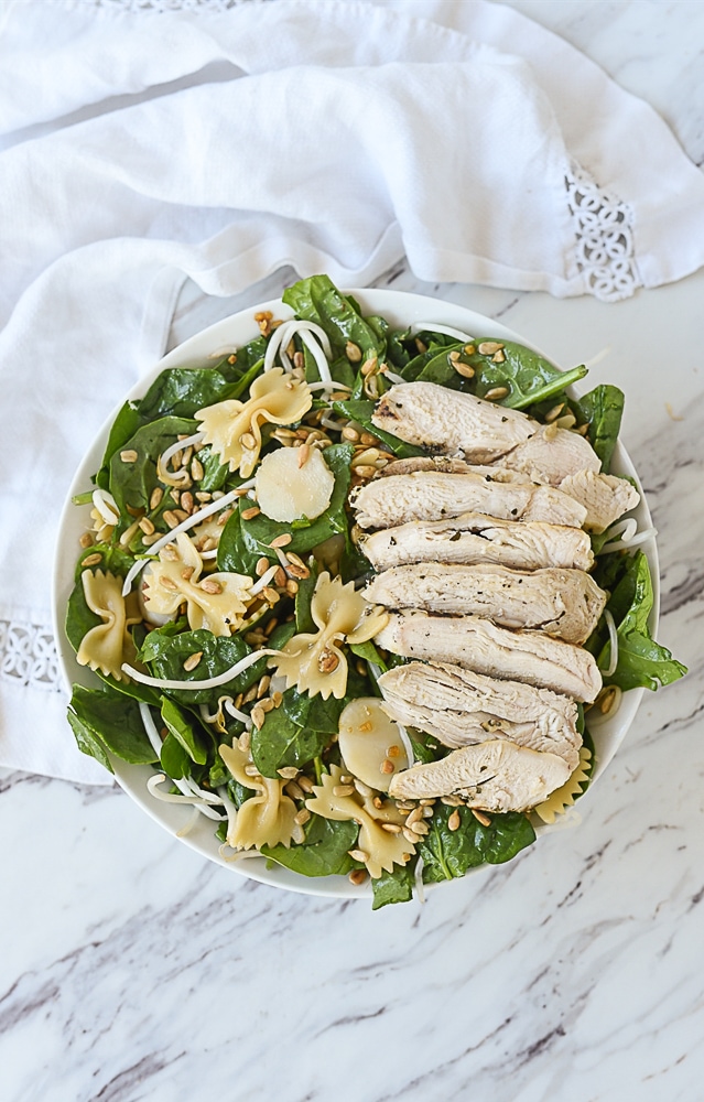 chicken on asian spinach salad
