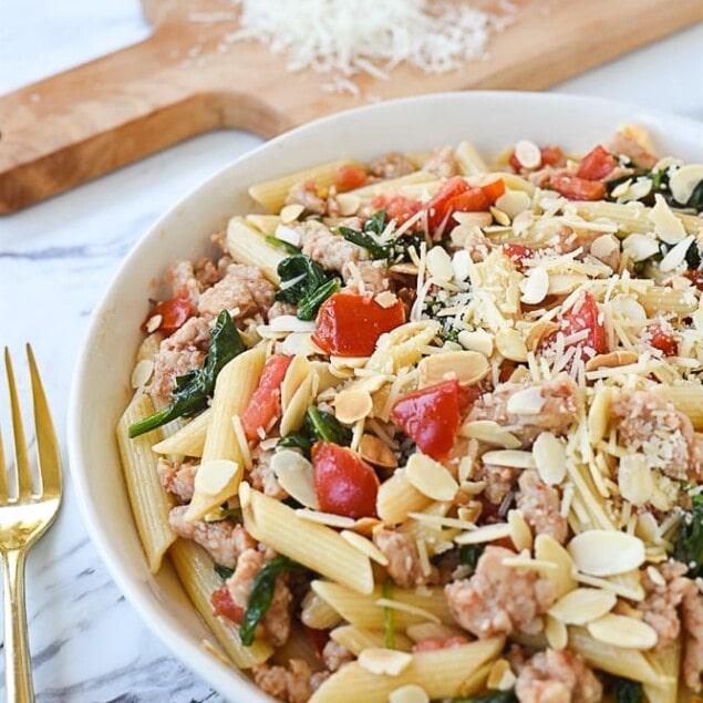 white bowl of chicken sausage pasta