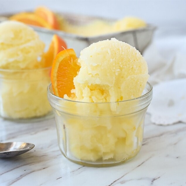 two scoops of orange ice