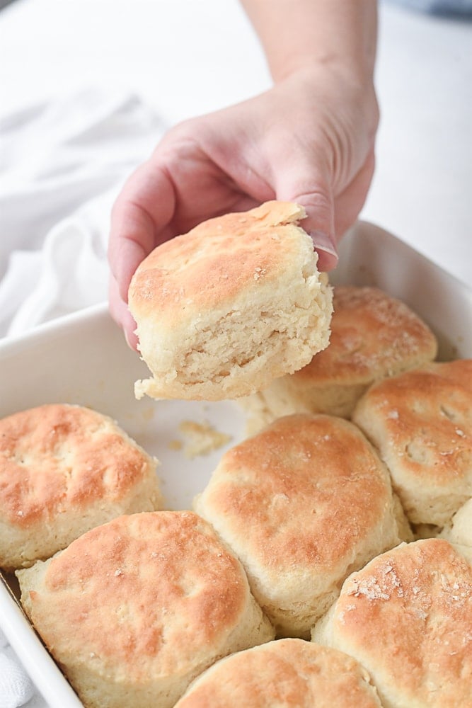 7 Up Biscuits hand holding a biscuit
