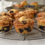 cooling rack of blueberry muffins