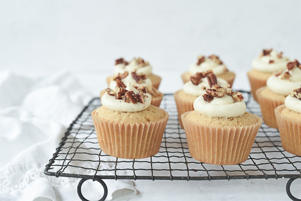 brown sugar cupcakes with frosting on top