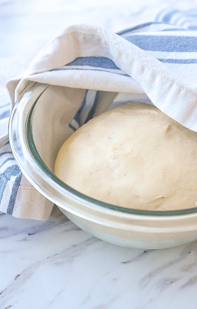 dough rising in a bowl