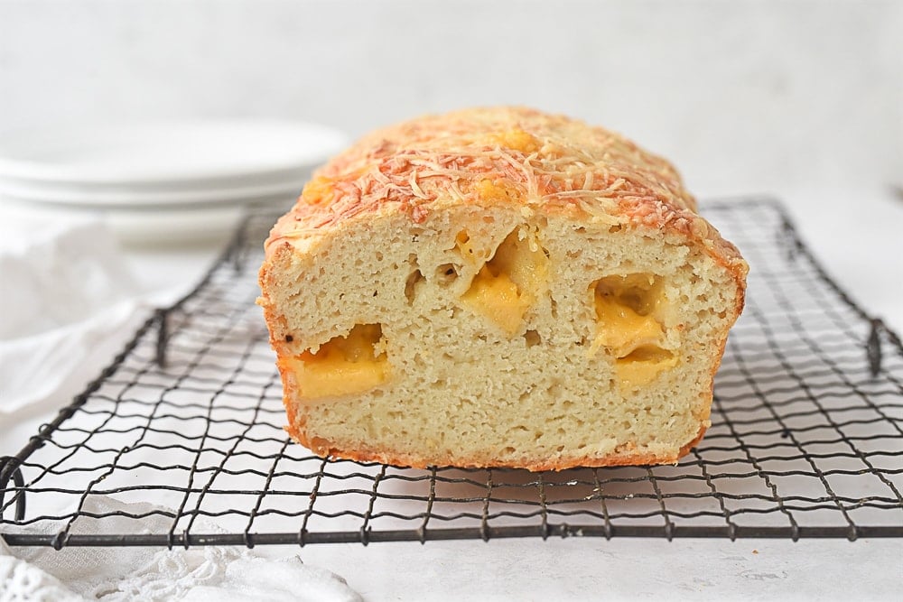 loaf of cheese bread sliced