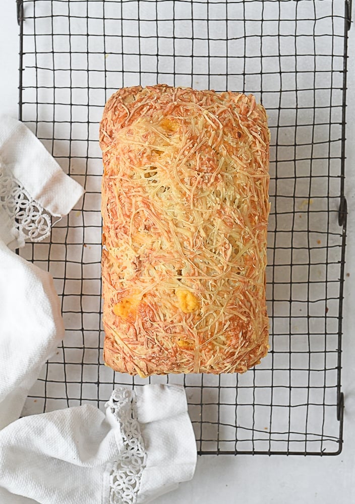 overhead shot of loaf of quick cheese bread