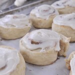 biscuit cinnamon rolls on a baking sheet