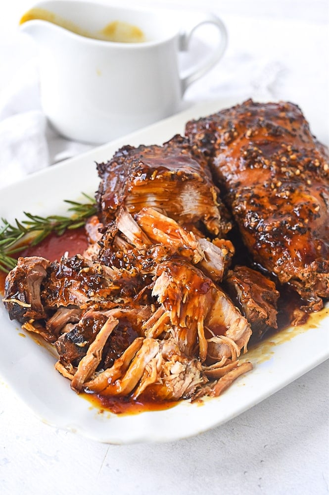 parmesan honey pork roast on a plate