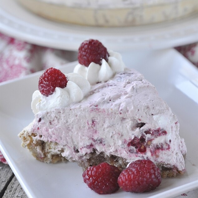 slice of raspberry meringue pie