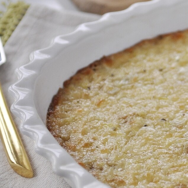 white bowl of artichoke dip
