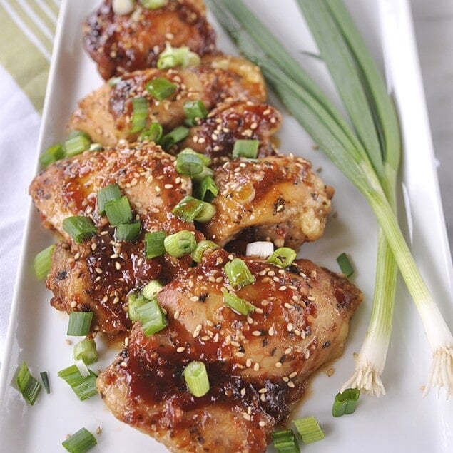 white plate of honey ginger chicken