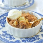 bowl of apple crisp with ice cream