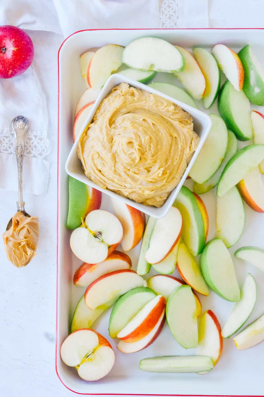 tray of apples with peanut butter dip