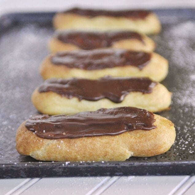 plate of chocolate eclairs