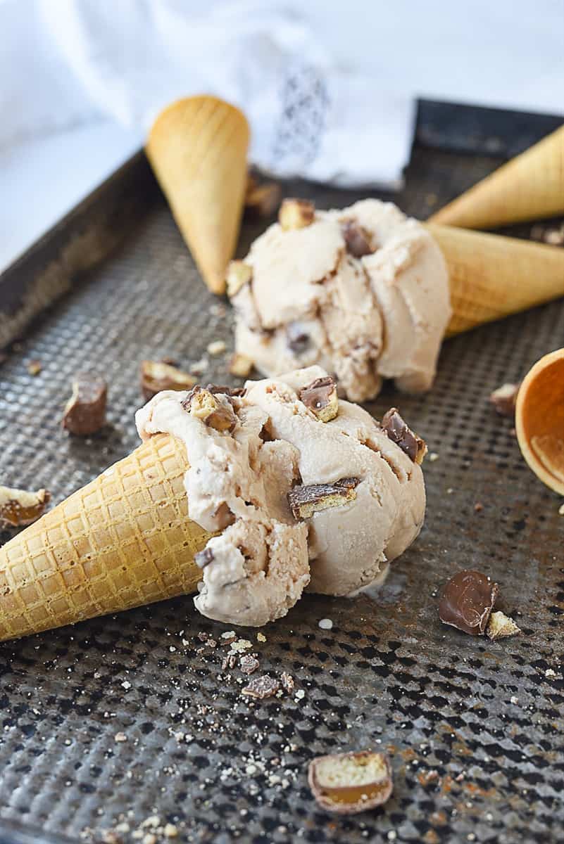 two cones of candy bar ice cream